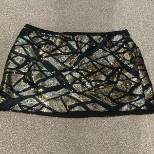 Gold and black sequin mini skirt